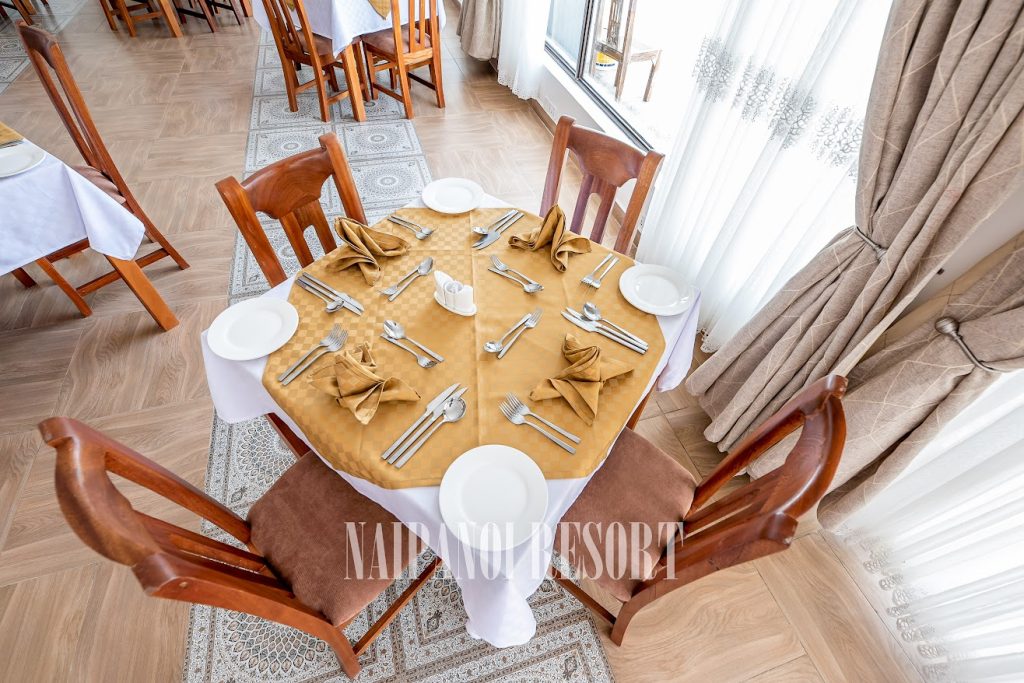 5 star resort in naivasha called Naipanoi Resort with a restaurant
